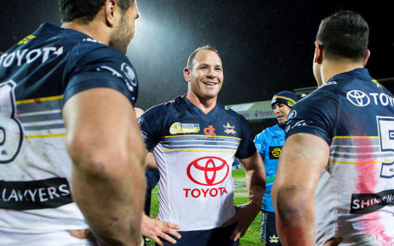 Picture by Alex Whitehead/SWpix.com - 21/02/2016 - Rugby League - Dacia World Club Challenge - Leeds Rhinos v North Queensland Cowboys - Headingley Carnegie Stadium, Leeds, England - North Queensland Cowboys' Matt Scott (second left) celebrates the win with team-mates.