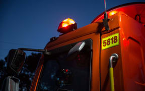 A fire truck set up at the base of Waimarama Rd.