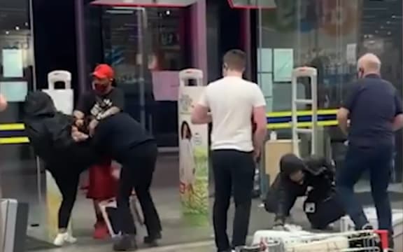 A video showed a violent scuffle between alleged shoplifters and security at a Kmart shop in Hamilton.