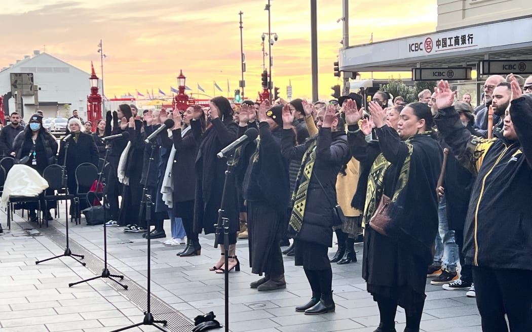 Iwi leaders, construction workers and members of the public gathered in Auckland's CBD on 27 July 2023 to bless the site where a gunman killed two men a week earlier.