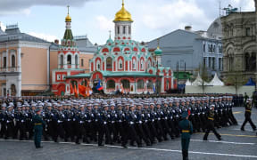 Russian sailors march on Red Square during the Victory Day military parade in central Moscow on May 9, 2022. - Russia celebrates the 77th anniversary of the victory over Nazi Germany during World War II.