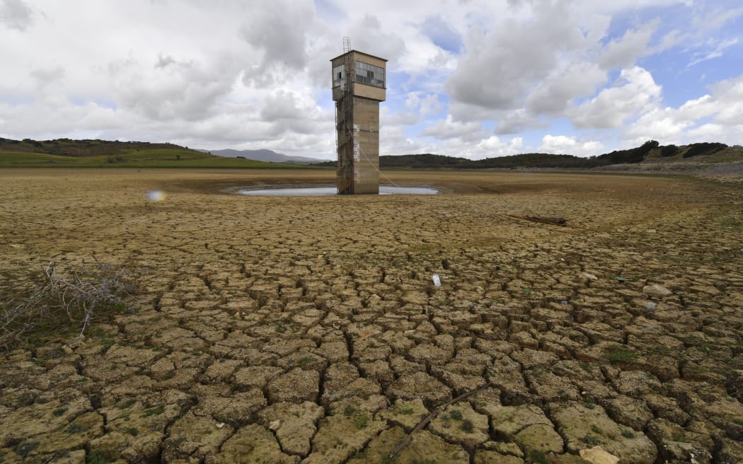 A picture taken on April 4, 2023, shows the dry Chiba dam near the city of Korba in northeastern Tunisia. The North African country's dams are at critical lows following years of drought, exacerbated by pipeline leaks in a decrepit distribution network.