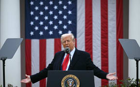 US President Donald Trump delivers remarks on reciprocal tariffs during an event in the Rose Garden entitled "Make America Wealthy Again" at the White House in Washington, DC, on April 2, 2025. Trump geared up to unveil sweeping new "Liberation Day" tariffs in a move that threatens to ignite a devastating global trade war. Key US trading partners including the European Union and Britain said they were preparing their responses to Trump's escalation, as nervous markets fell in Europe and America. (Photo by Brendan SMIALOWSKI / AFP)