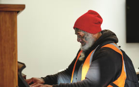 Cookie - a Mission, and now HomeGround regular, plays the piano in Haeata, the HomeGround dining room