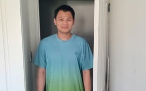 Flat Bush resident Binh Hoang says he was on the phone to police, as the robbers broke through his bedroom door.
