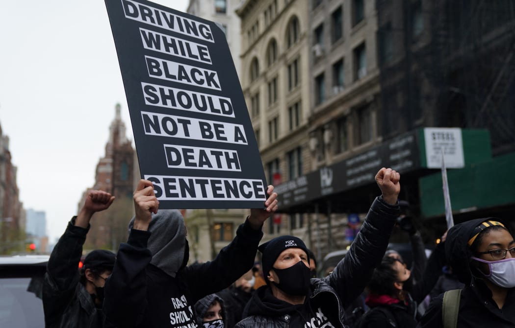 Protestors gather in Washington Square Park in New York April 12, 2021 during a protest after the 20yo was fatally shot.