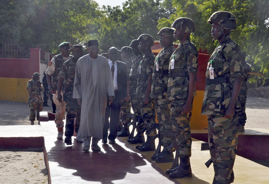 President Goodluck Jonathan inspects soldiers of the 7th Division of the Nigerian Army, which is fighting Boko Haram terrorists.