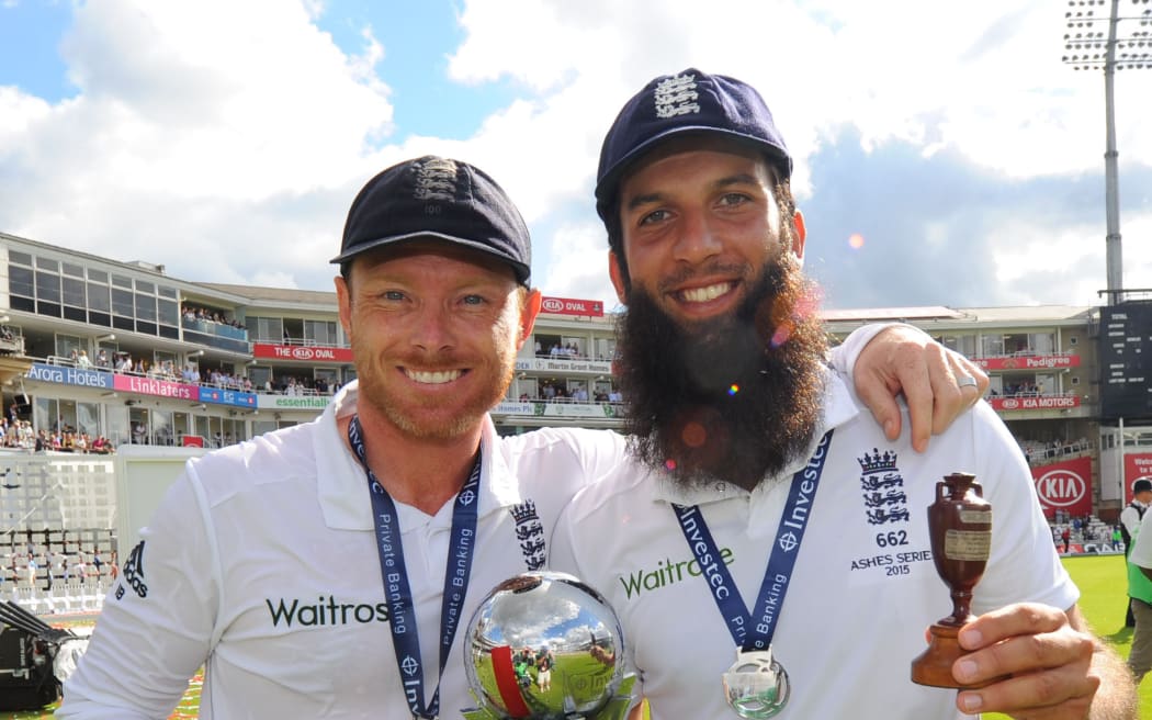 England batsman Ian Bell (left) and Moeen Ali pose with the Ashes Trophies, 2015.