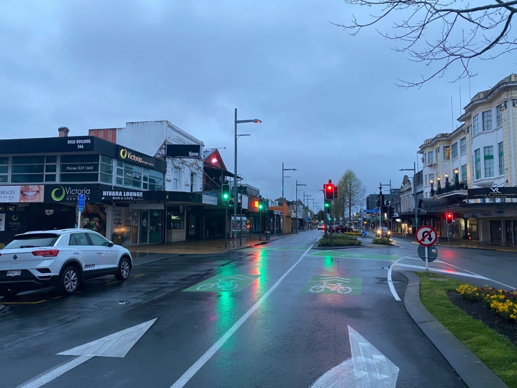 A quiet Hamilton street on Monday as part of the Waikato region starts five days of alert level 3 following two community cases of Covid-19.