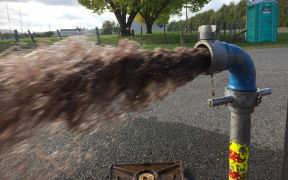 Water is flushed from Martinborough’s water mains. The town’s 2019 E.coli scare brought New Zealand’s infrastructure crisis into sharp focus in Wairarapa.