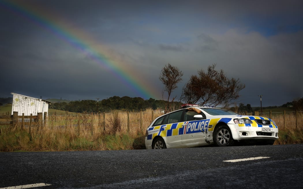 A crashed police car remains on the side of Ngamokai Road as the hunt for Dolphy Kohu continues.