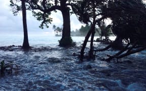 A high tide across Ejit Island in Majuro Atoll, Marshall Islands on March 3, 2014, causing widespread flooding. Officials in the Marshall Islands blamed climate change for severe flooding in the Pacific nation's capital Majuro.