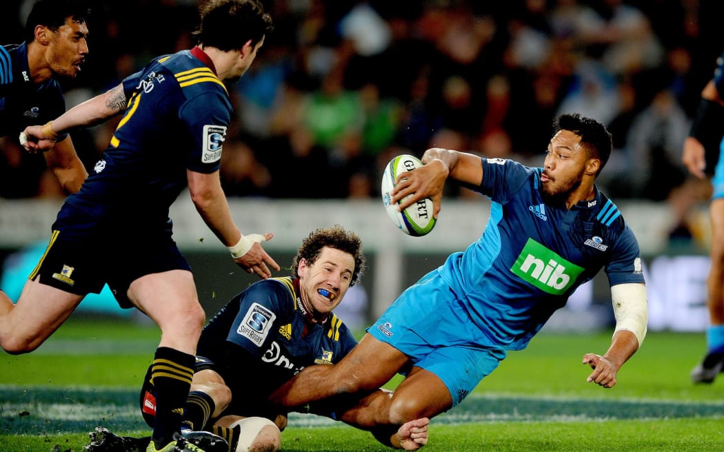 George Moala of the Blues off loads, during the Super Rugby match between the Highlanders and the Blues, held at Forsyth Barr Stadium in Dunedin.