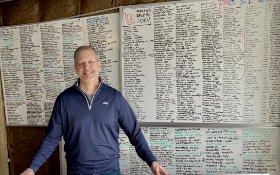 Mike O’Brien with his phrase board.