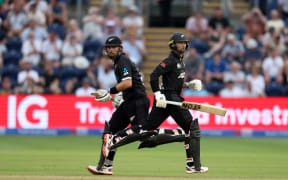 Devon Conway (right) of New Zealand batting with Daryl Mitchell.