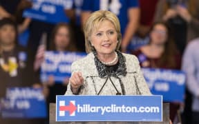 Hillary Clinton addresses a rally in Columbia, South Carolina following her sweeping victory in the state's Democratic primary.