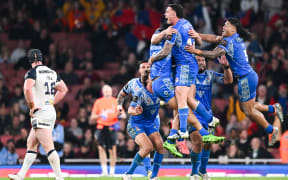 Samoa celebrate their 2021 Rugby League World Cup Semi Final win over England