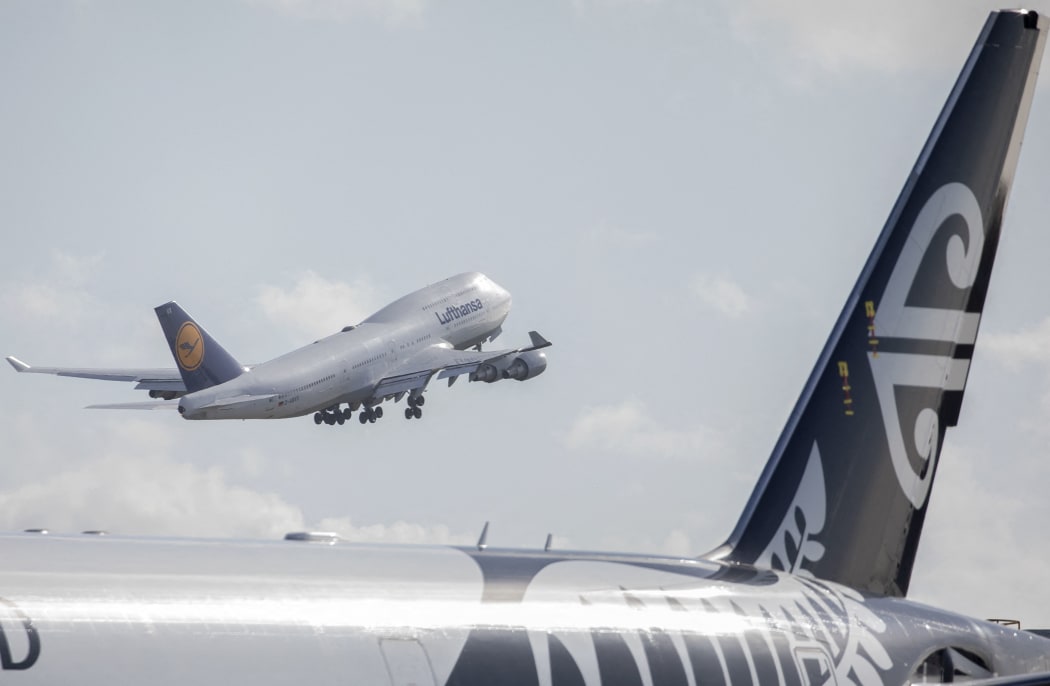 A Lufthansa aircraft repatriating German tourists takes off headed to Frankfurt from Christchurch Airport in Christchurch on April 8, 2020.