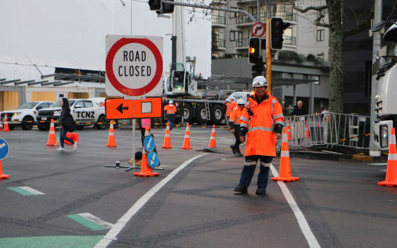 Victoria St has been closed off after a panel fell off a building.