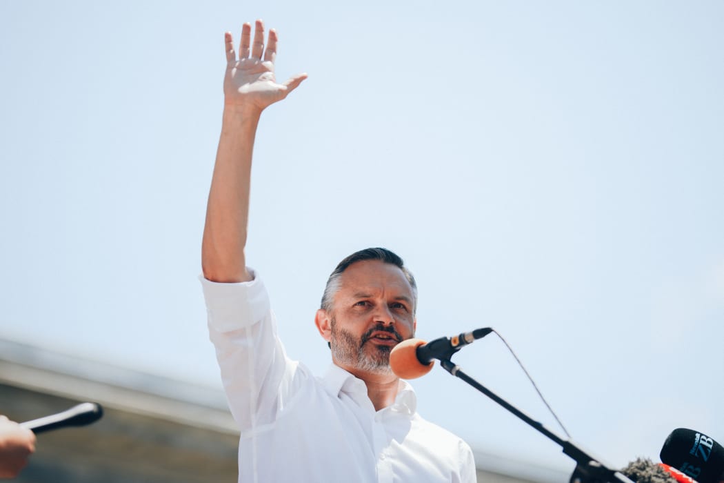 Green Party co-leader James Shaw responding to the demands from School Strike 4 Climate outside parliament on 26 January, 2021.