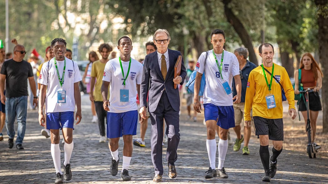 A still from the 2024 Netflix film The Beautiful Game featuring Bill Nighy