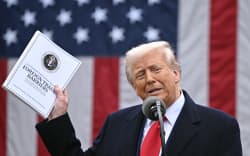 US President Donald Trump delivers remarks on reciprocal tariffs during an event in the Rose Garden entitled “Make America Wealthy Again” at the White House in Washington, DC, on April 2, 2025. Trump geared up to unveil sweeping new “Liberation Day” tariffs in a move that threatens to ignite a devastating global trade war. Key US trading partners including the European Union and Britain said they were preparing their responses to Trump’s escalation, as nervous markets fell in Europe and America. (Photo by Brendan SMIALOWSKI / AFP)
