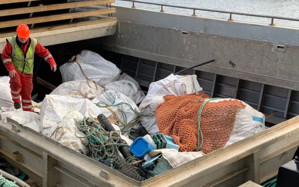 Rubbish being sorted in Bluff
