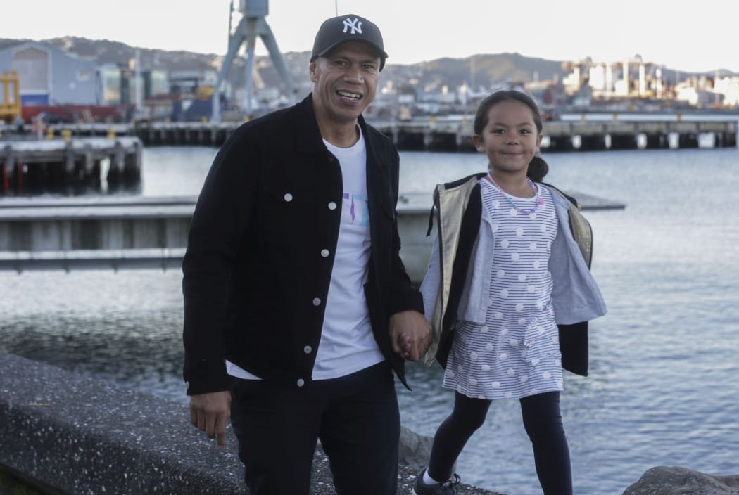 "I have never, never raised a hand against my children," says Natu Taufale, pictured here with his youngest child.