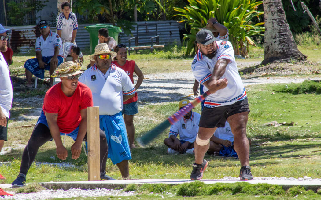 A batsman for Amelika connects with the ball for six.