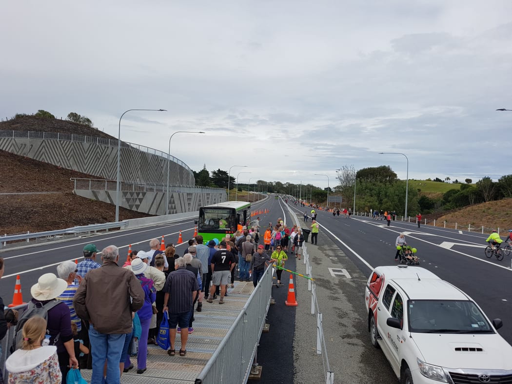 Pedestrians checking out the Kapiti Expressway ahead of its opening to traffic.