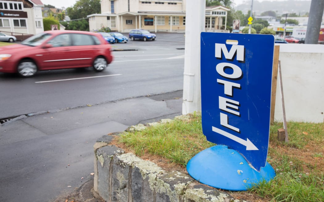 A sign advertising a local motel in Auckland
