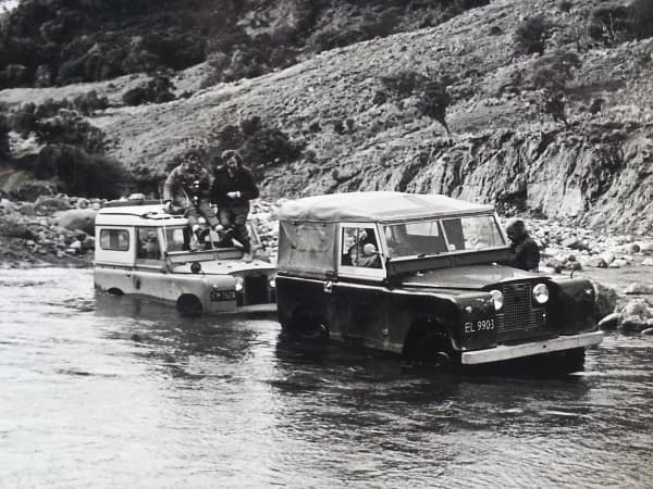Cameraman Mike O Connor and director Tony Rimmer get towed by a friendly farmer, 1970.
