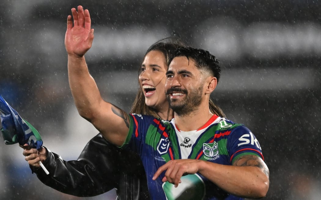 Shaun Johnson and wife Kayla wave to the crowd at Go Media Mt Smart Stadium.
