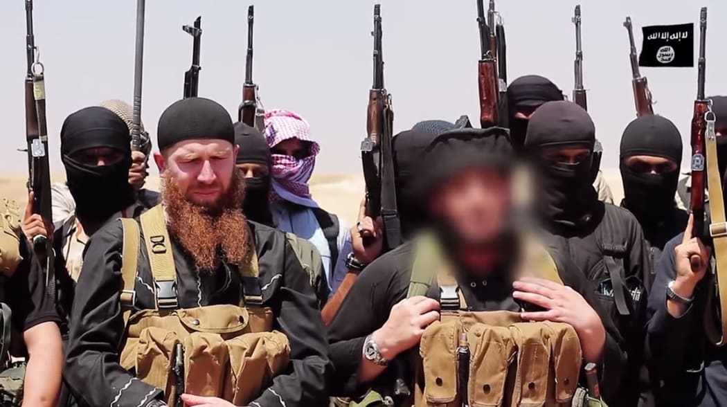 An image made available by Jihadist media claims to show members of Islamic State.