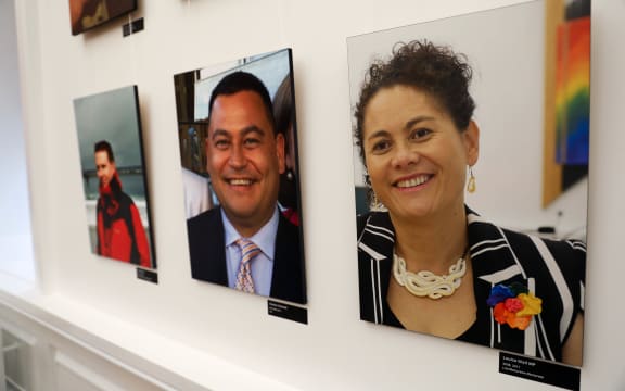 Photos of LGBTQ Parliamentarians on the wall of the rainbow room. Labour MP Louisa Wall's portrait is on the right.