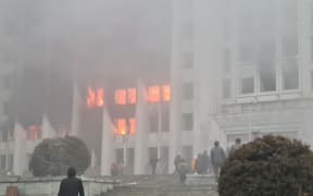 ALMATY, KAZAKHSTAN - JANUARY 5: Protesters enter the governor's office as protests continue across Kazakhstan against fuel price increase, in Almaty, Kazakhstan on January 5 2022.