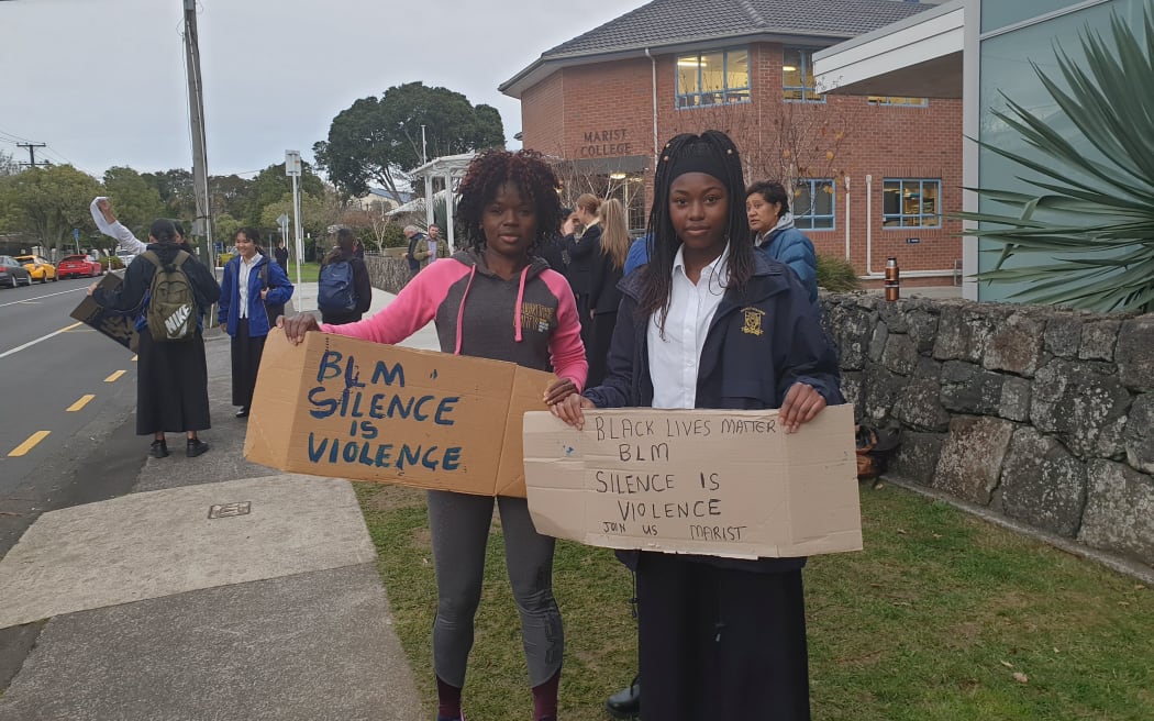About 30 students and some of their parents protested outside Marist College in Auckland on 16 June after Black Lives Matter posters were taken down at the school.