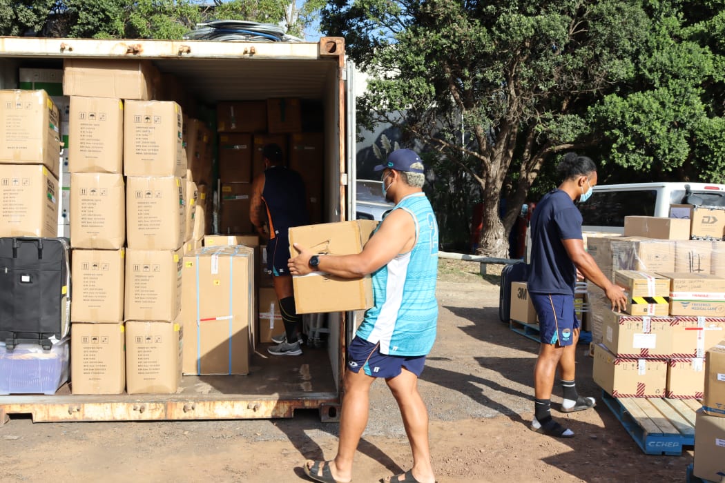Moana Pasifika Loading supplies into a container bound for Tonga.