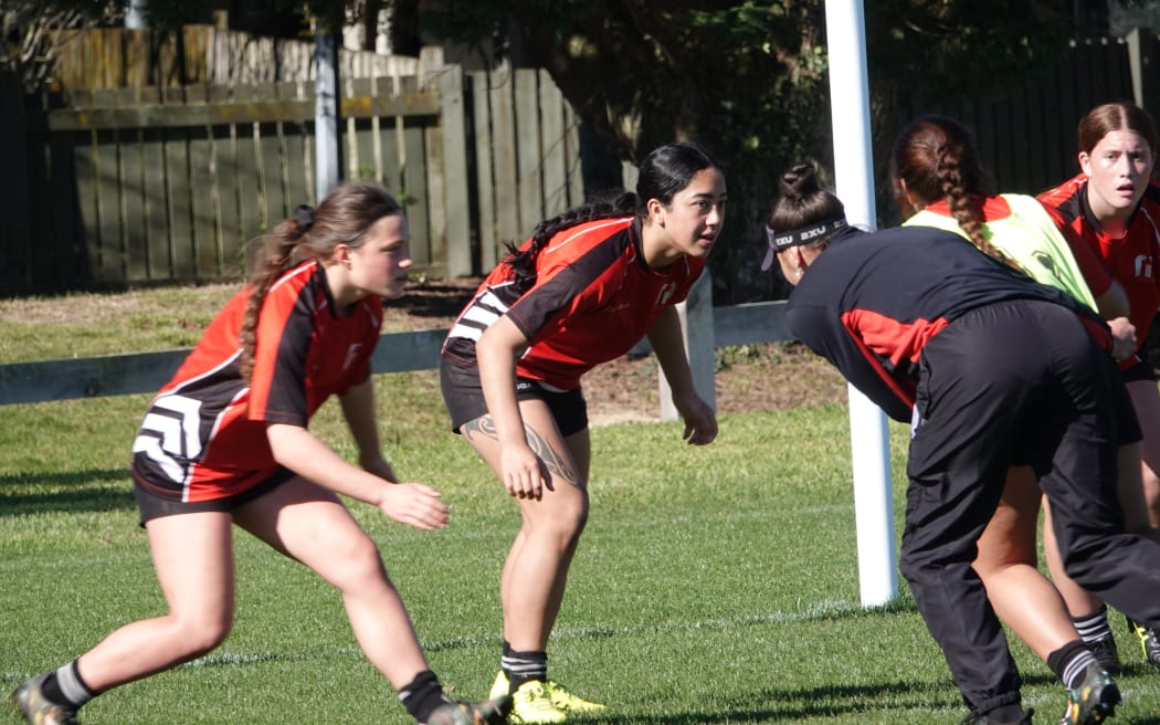 Kingston Taiapa, centre, is in her fourth year in the Manukura first XV.