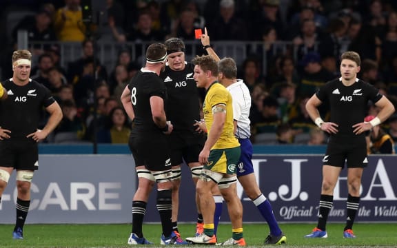Scott Barrett of the All Blacks is sent off by referee, Jerome Garces