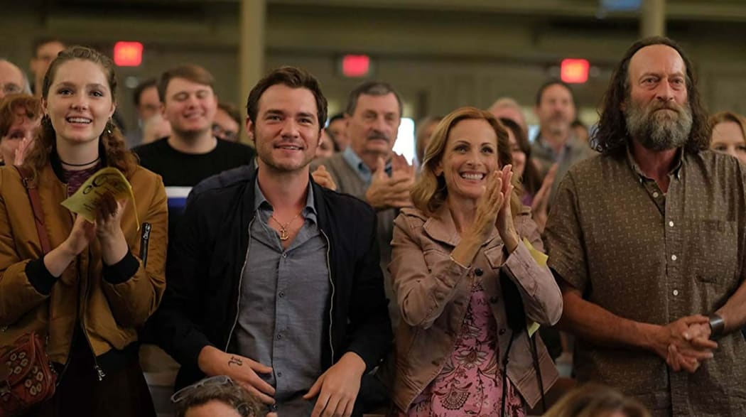 The Rossi family, Daniel Durant (second from left), Marlee Matlin (centre), Troy Kotsur