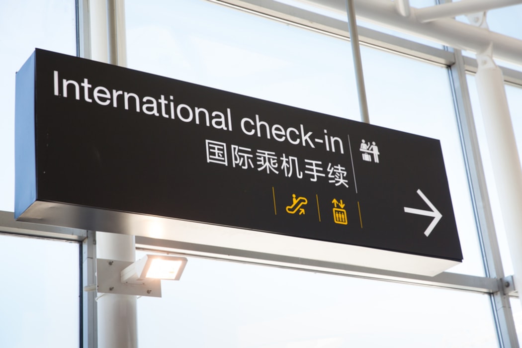 Signage for check-in at Auckland International Airport