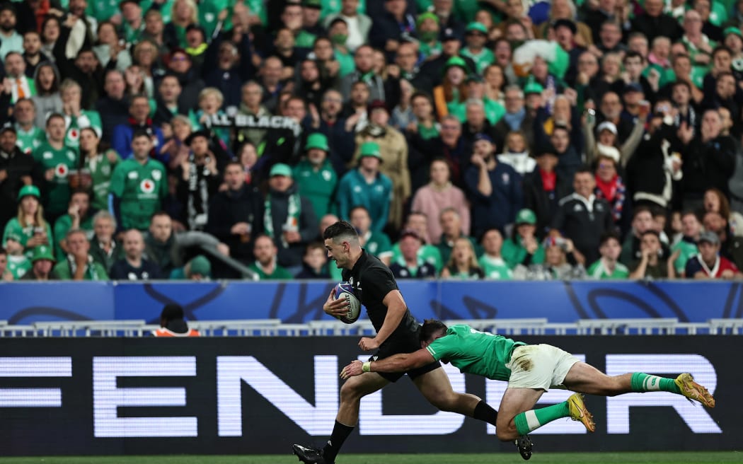 New Zealand's right wing Will Jordan runs with the ball to score a try during the France 2023 Rugby World Cup quarter-final match between Ireland and New Zealand at the Stade de France in Saint-Denis, on the outskirts of Paris, on 14 October, 2023.