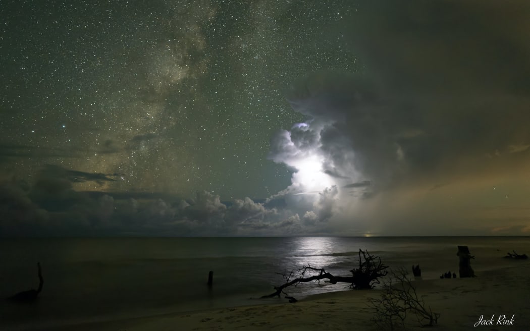 Lightning flash in sky above Jungle Beach, Florida