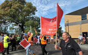 About fifty Community Corrections workers demonstrating outside the Manukau District Court in Auckland.