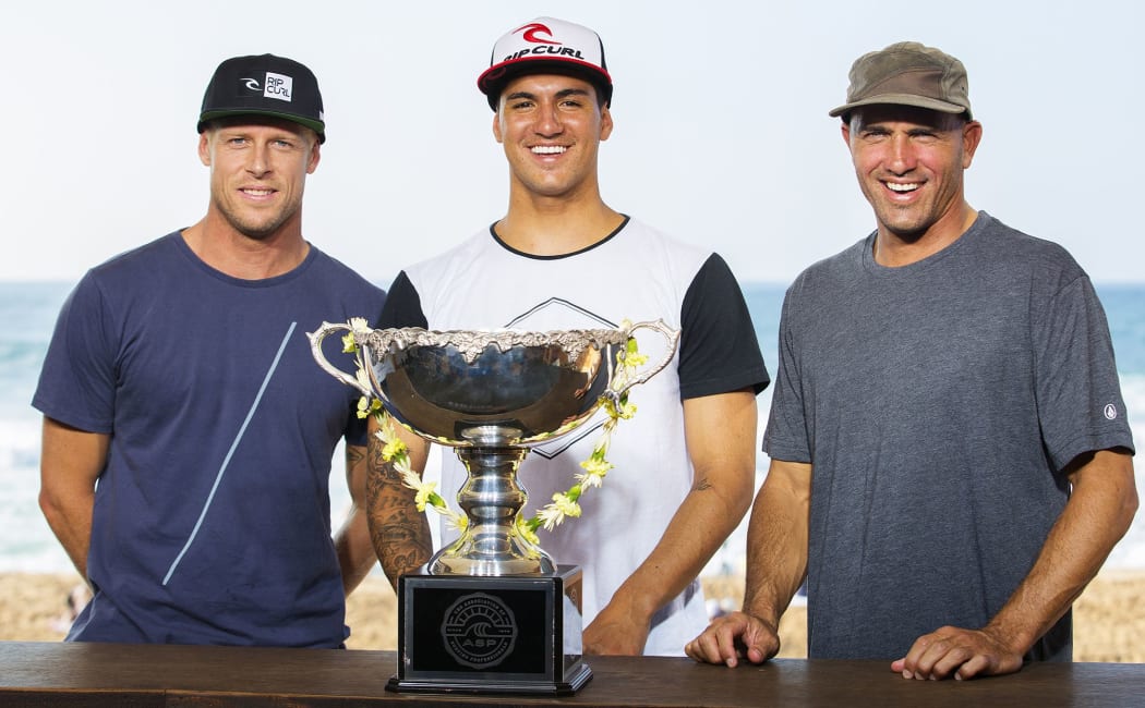 Gabriel Medina (centre) with American great Kelly Slater (right) and Australian Mick Fanning