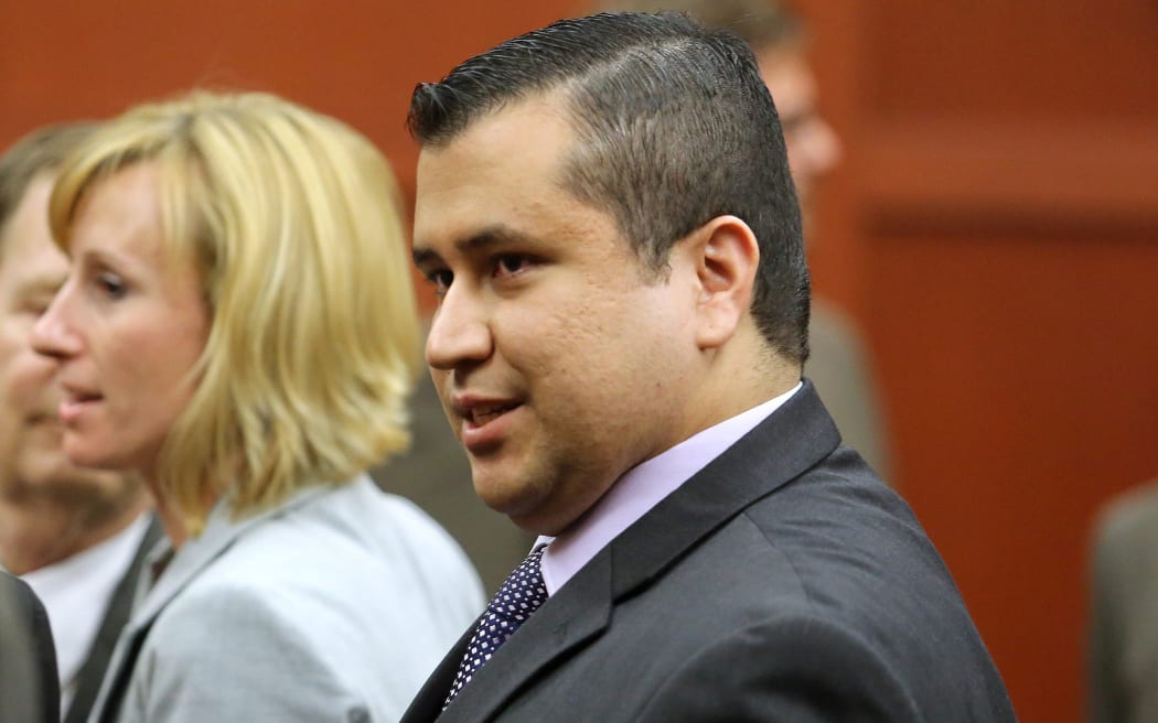 George Zimmerman leaves the courtroom a free man after being found not guilty, on the 25th day of his trial at the Seminole County Criminal Justice Center July 13, 2013 in Sanford, Florida.