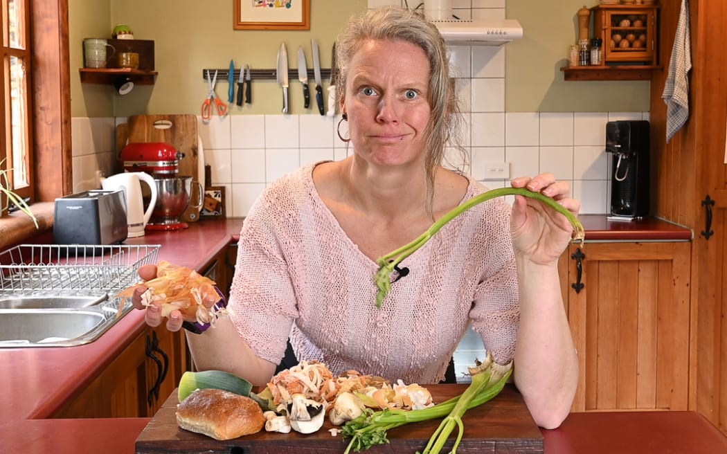 Chef Del Holland holding limp vegetables.
