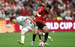 VANCOUVER, BRITISH COLUMBIA - JUNE 21: Mohanad Lashin #17 of Egypt is challenged by Jesse Randall #21 of New Zealand during the FIFA World Cup 2026 Group G match between New Zealand and Egypt at BC Place Vancouver on June 21, 2026 in Vancouver, British Columbia. (Photo by Emilee Chinn/Getty Images)