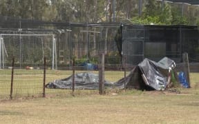 Five children were injured when a jumping castle flipped in strong winds.